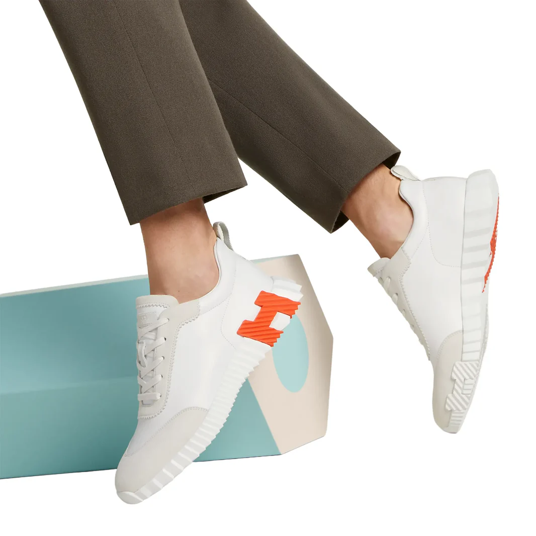 hermes-paris-bouncing-calf-sneaker-white-orange-h221898zh94400-model-wear
